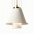 Suspended pendant light fixture with pleated white shade and glass diffuser
